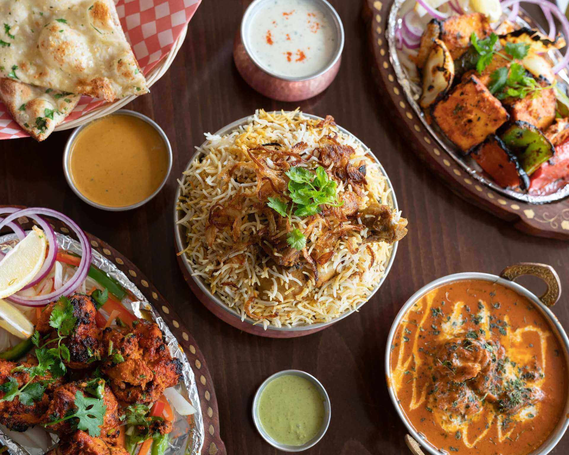 indian food on restaurant table 1920x1536 1